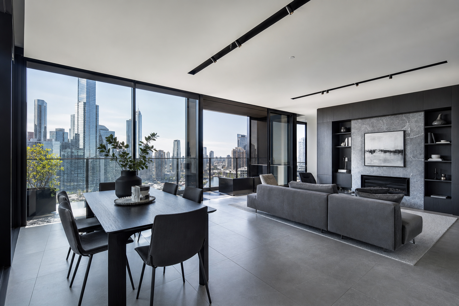 Luxury open-plan apartment interior with natural light and refined charcoal joinery